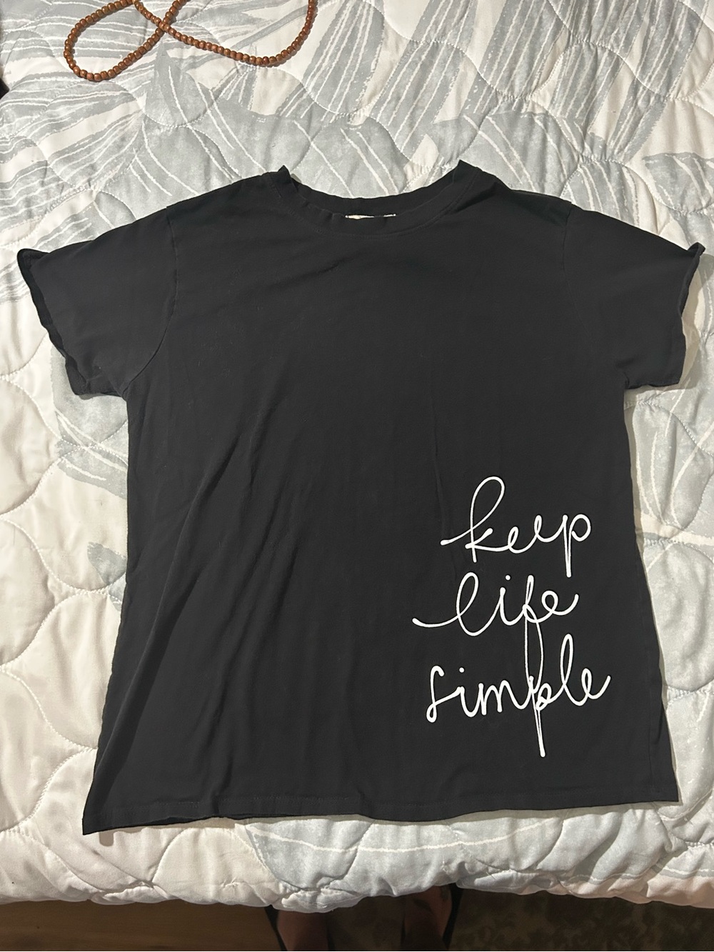 french pastry Black Tee with White "keep life simple" Script